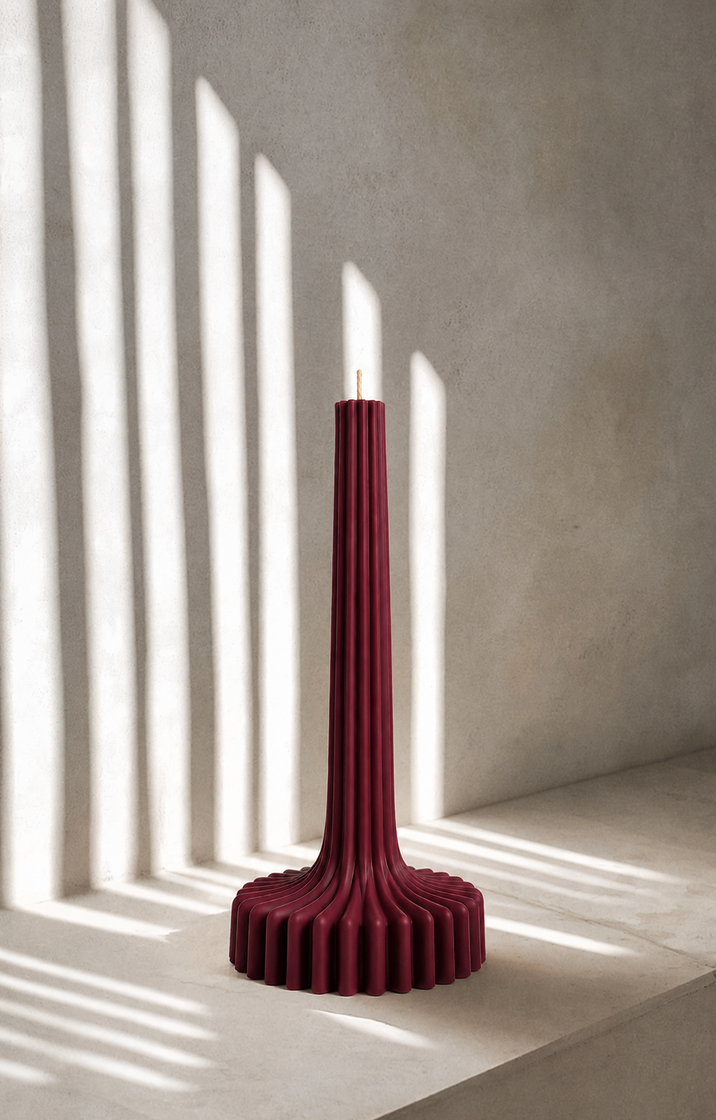 Green ribbed decorative candle