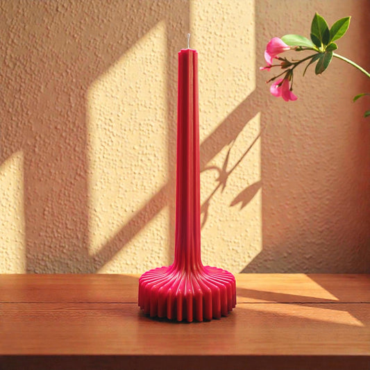 Red ribbed decorative candle