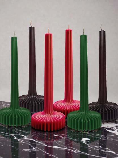 Green ribbed decorative candle