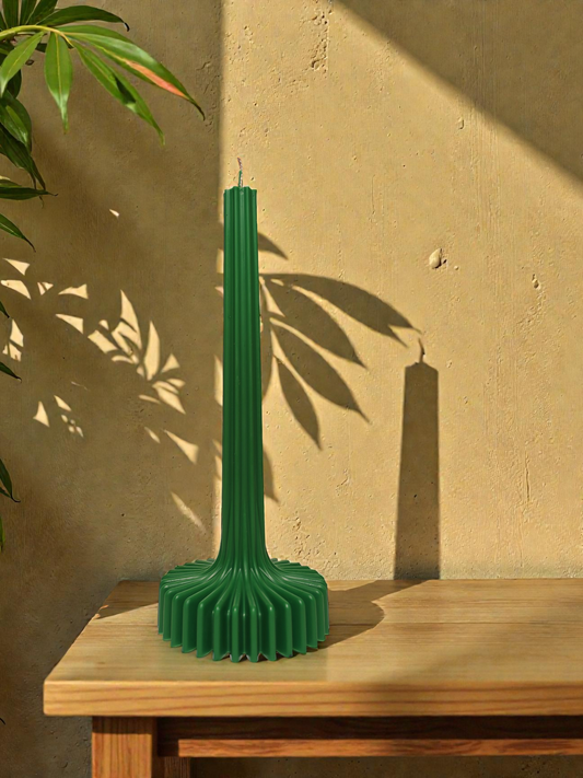 Green ribbed decorative candle