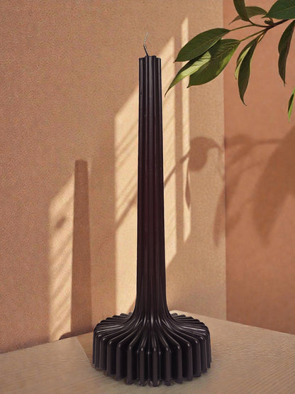 Black ribbed decorative candle