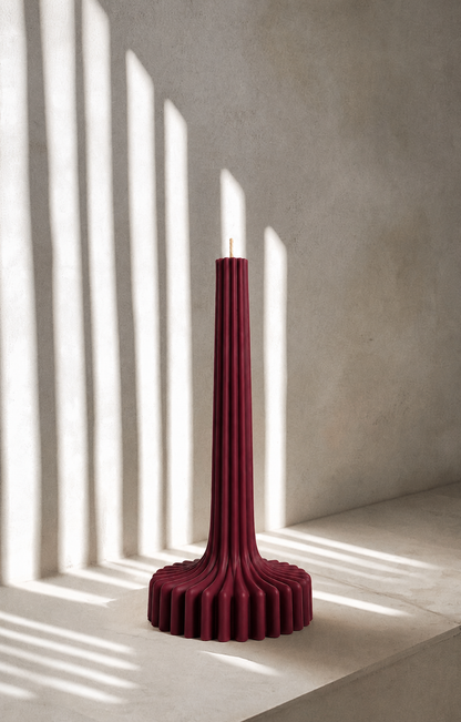 Green ribbed decorative candle