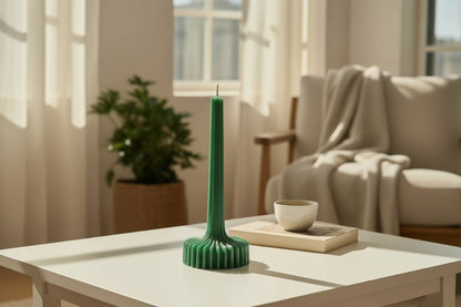 Green ribbed decorative candle