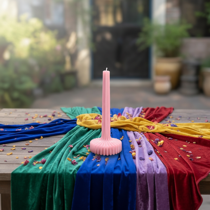 Pink ribbed decorative candle